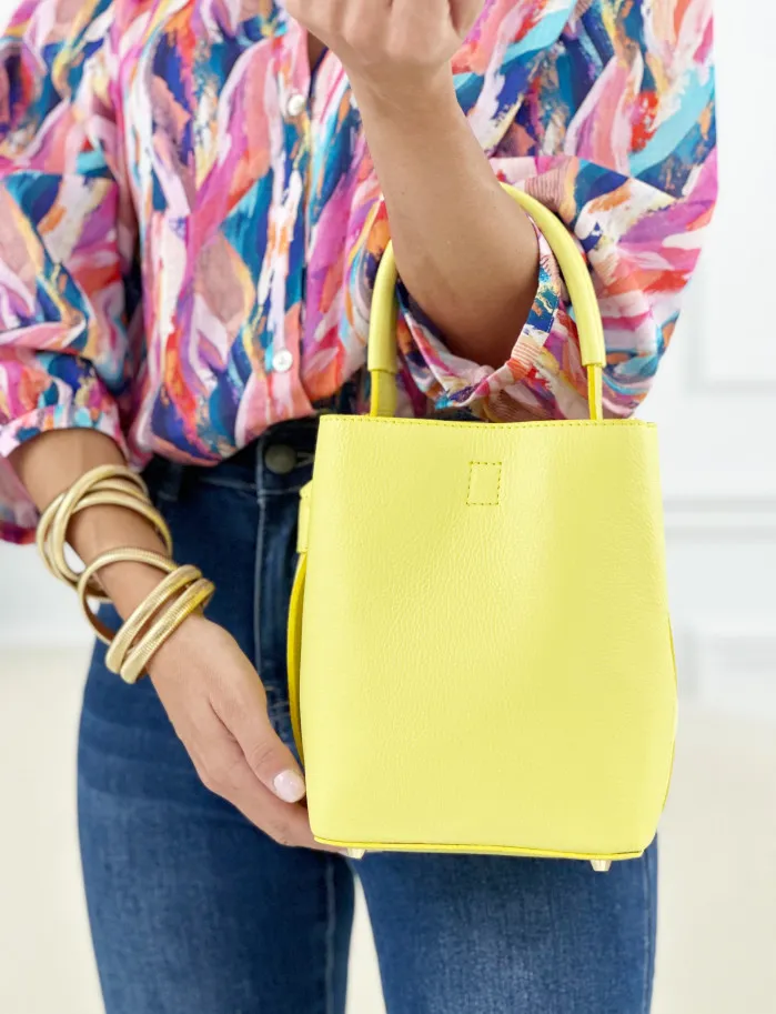 Bolso bucket amarillo limón