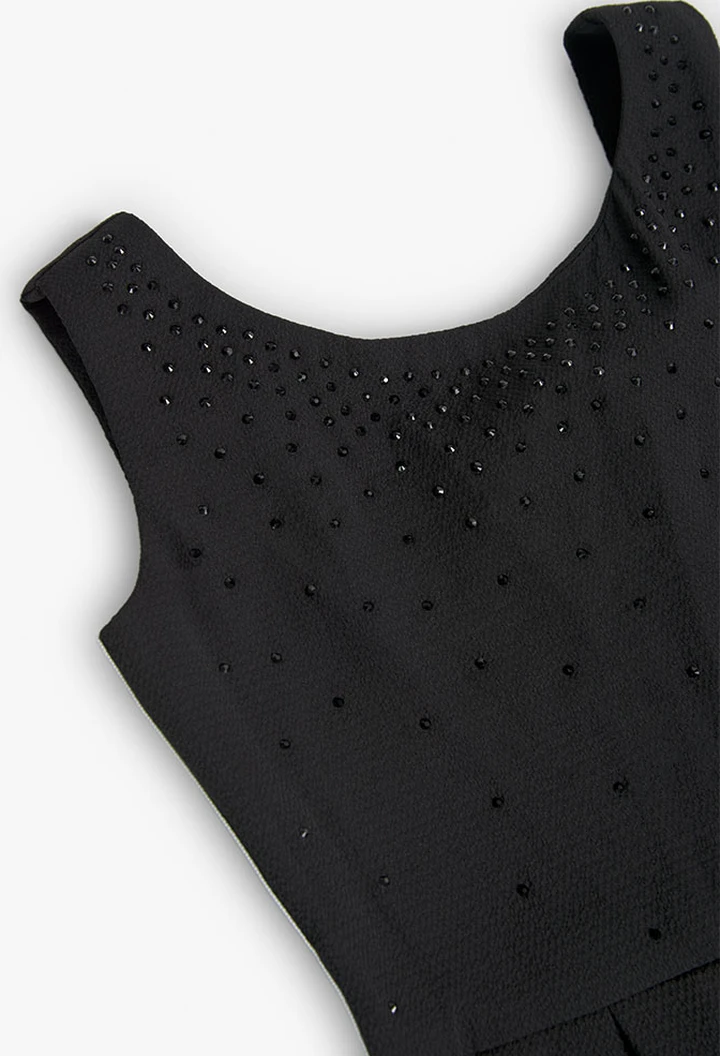 Mono crepe de niña en negro