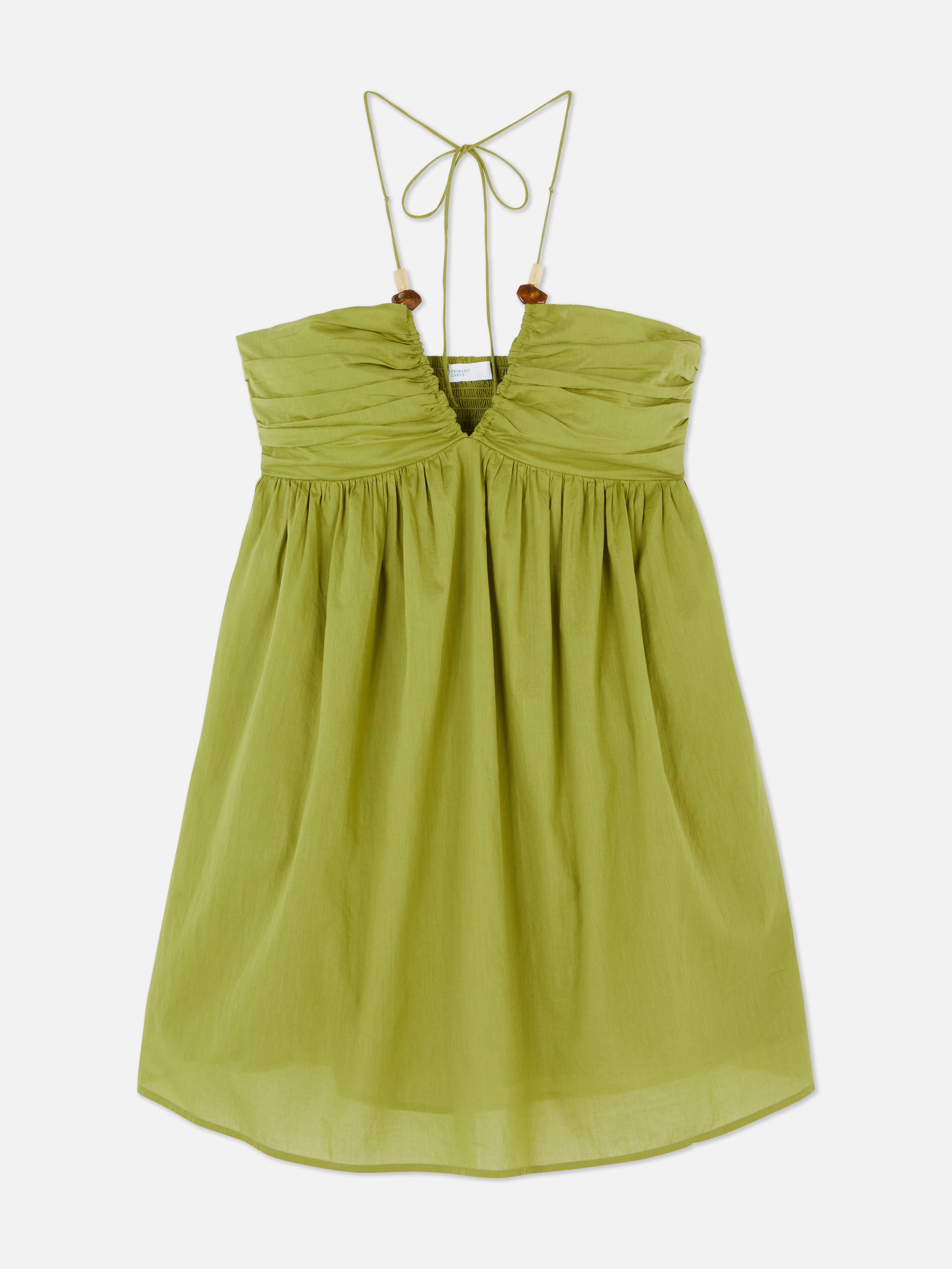 Vestido corto con escote halter y abalorios